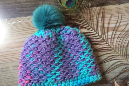 Por que será que os gorros possuem pompons